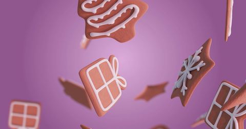 Festive Falling Gingerbread Cookies on Purple Background