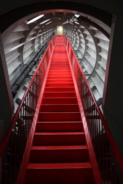 Red Staircase in Modern Industrial Tunnel - Download Free Stock Photos Pikwizard.com