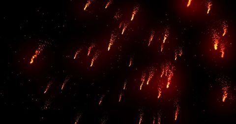 Sparkling Red Fireworks Against Dark Sky