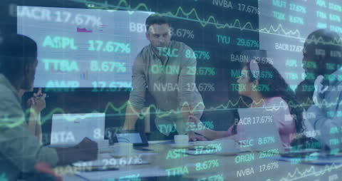 Business Team Analyzing Digital Financial Data in Office Meeting