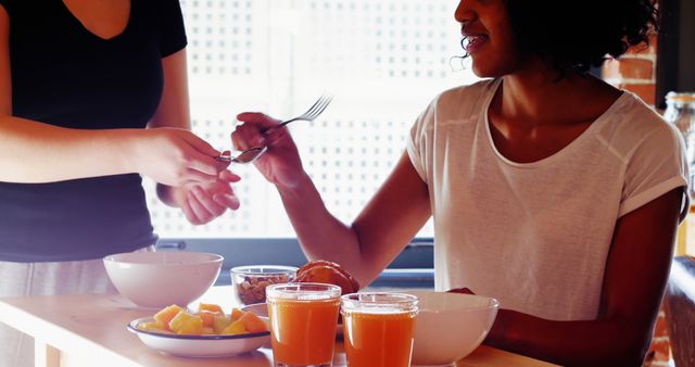 Friends Enjoying Healthy Breakfast Together at Home - Download Free Stock Images Pikwizard.com