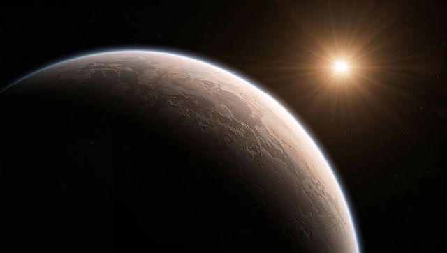 Revealing rocky exoplanet with sunlit crescent, textured surface and thin atmospheric limb