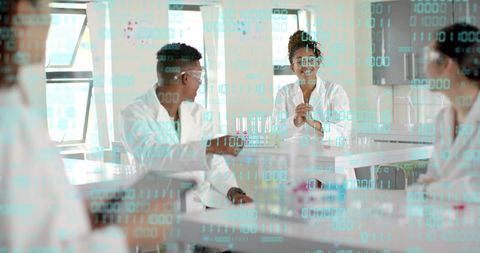 Laboratory team collaborating and analyzing digital data with test tubes and tablet