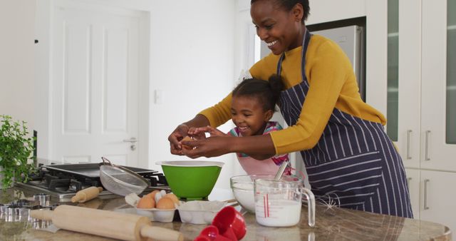 Mother and Daughter Enjoying Cooking Together in Modern Kitchen - Download Free Stock Images Pikwizard.com