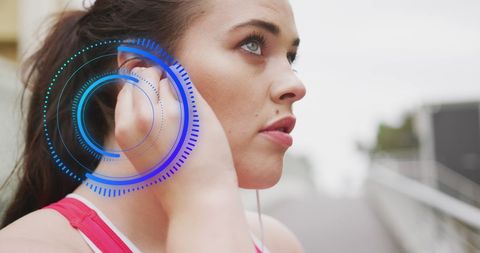 Fitness Tech Enhancement: Woman Exercising with Smart Earphones