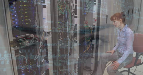 IT Engineer Monitoring Data Servers with Digital Overlay