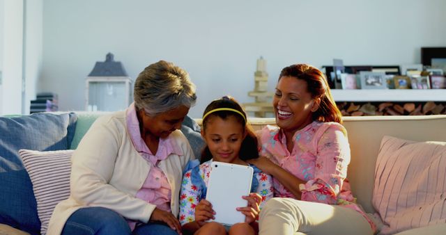 Three Generations Family Bonding with Digital Tablet - Download Free Stock Images Pikwizard.com