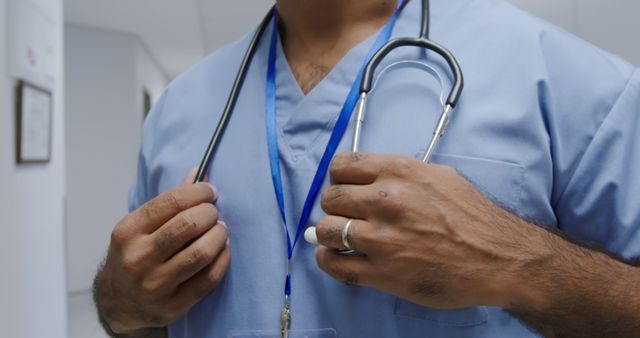 Healthcare Professional with Stethoscope in Hospital Corridor - Download Free Stock Images Pikwizard.com