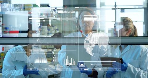 Female scientists collaborating and analyzing holographic global data in research laboratory