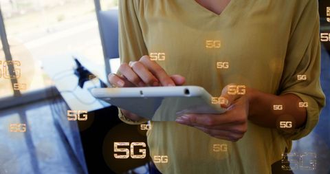 Businesswoman Using Tablet with 5G Technology Overlay