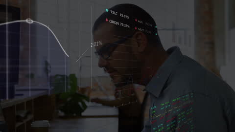 Data Analyst Contemplating Financial Trends and Graphs