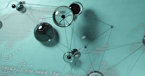 Glassy node network connecting hollow rings and spheres over teal dotted world map, tech