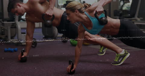 People Exercising with Kettlebells Amidst Digital Financial Graphics