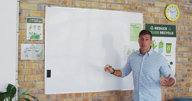 Environmental Educator Teaching Recycling Concepts on Whiteboard - Download Free Stock Images Pikwizard.com