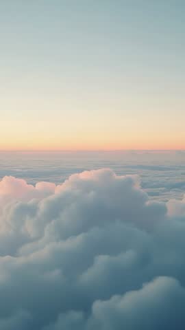 Vertical Aerial Sunrise Over Pastel Cumulus Clouds, Tranquil High-Altitude Motion