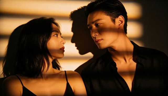 Intimate cinematic asian couple facing across amber blinds casting dramatic shadows