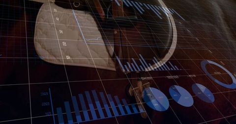 Resting stethoscope on wooden desk showing data visualization overlays for medical analytics