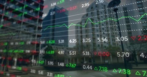 Financial Data Projection Over Cityscape Showing Economic Trends
