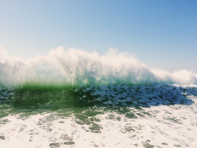 Powerful Ocean Wave Crashing During Sunny Day - Download Free Stock Photos Pikwizard.com