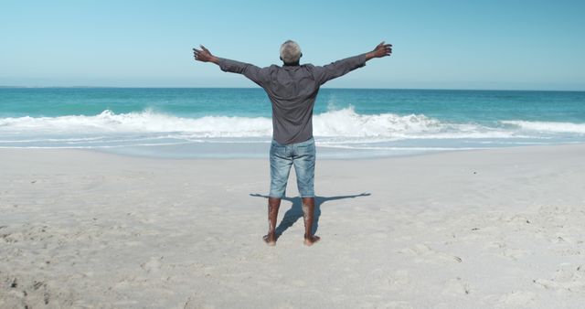 Senior Man Enjoying Ocean View at Tropical Beach - Download Free Stock Images Pikwizard.com