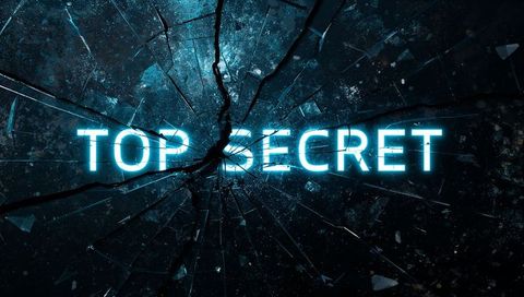 Glowing TOP SECRET wordmark shining through shattered glass with central impact cracks
