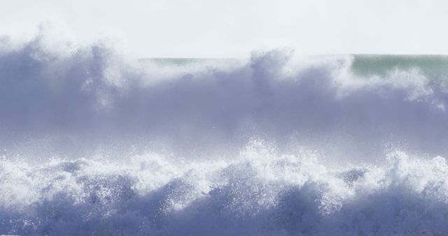 A powerful wave crests and crashes, showcasing the dynamic force of the ocean - Download Free Stock Photos Pikwizard.com