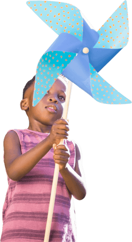 Happy child holding large blue pinwheel on transparent background