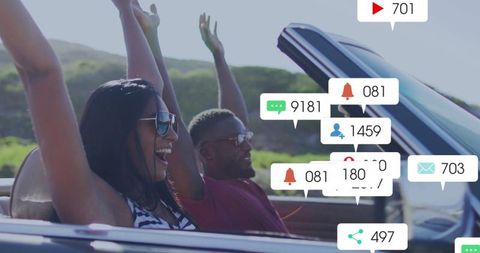 Happy Couple in Convertible Enjoying Scenic Drive