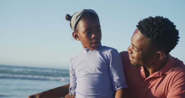 Father and Daughter Enjoying Quality Time at Beach - Download Free Stock Images Pikwizard.com