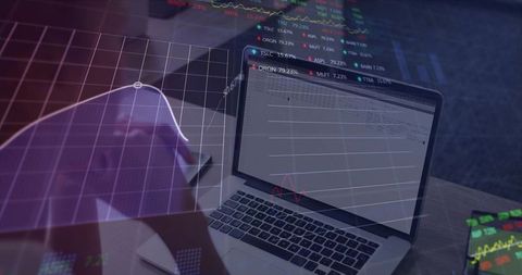 Mid-adult woman analyzing financial charts on laptop with market tickers and data overlay