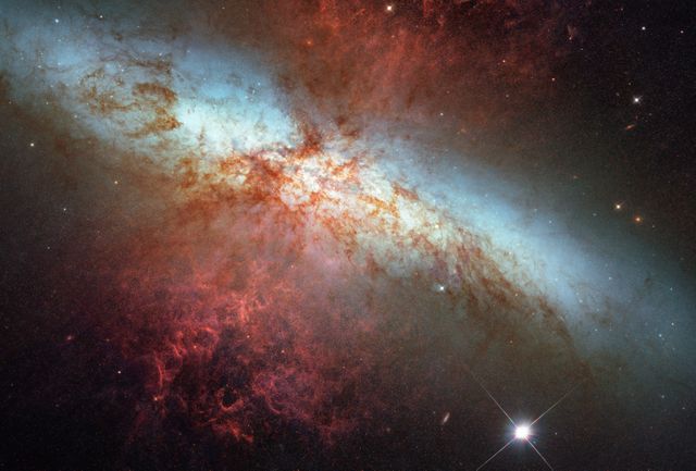Hubble Space Telescope captures spectacular view of supernova SN 2014J in galaxy M82, approximately 11.5 million light-years from Earth. This Type Ia supernova offers crucial data for distance measurement and the study of dark energy. Ideal for illustrating topics in astrophysics, supernova research, and space exploration. Excellent resource for educational materials, scientific publications, and space-themed articles.