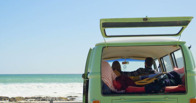 Couple Relaxing in Vintage Van by Ocean - Download Free Stock Images Pikwizard.com