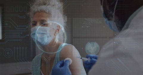 Masked woman receiving vaccine from gloved clinician with futuristic medical hud overlay