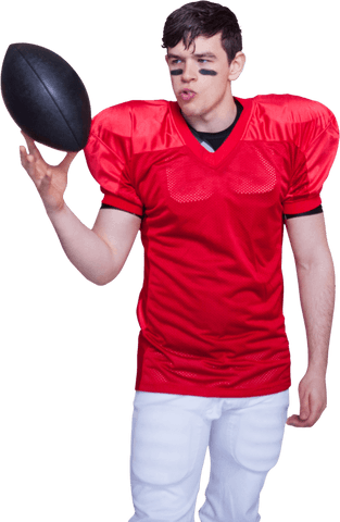 Transparent Football Player Spinning Football While Wearing Red Jersey and Facepaint