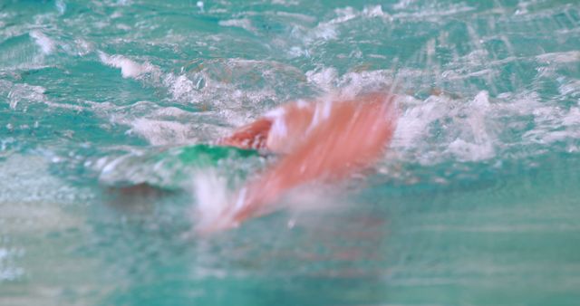 Blurred Swimmer in Pool Capturing Motion and Speed - Download Free Stock Images Pikwizard.com