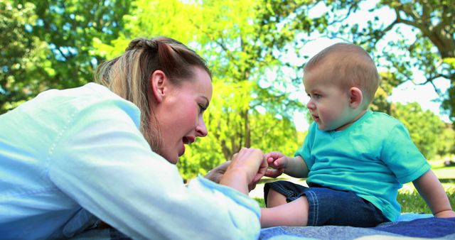 Mother Playing with Baby Outdoors on Blanket - Download Free Stock Images Pikwizard.com