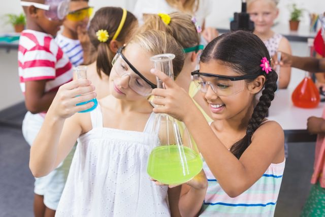 Kids Conducting Chemical Experiment in School Laboratory - Download Free Stock Photos Pikwizard.com