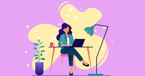 Woman Working from Home with Laptop and Coffee