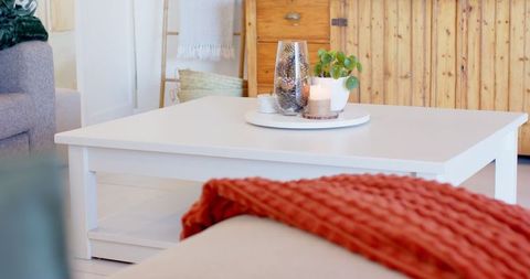 Cozy rustic living room with minimalist coffee table decor