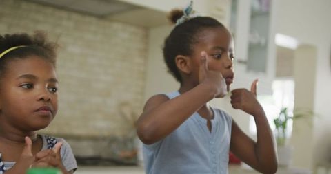 Joyful African American Girls Smiling in Kitchen - Download Free Stock Images Pikwizard.com