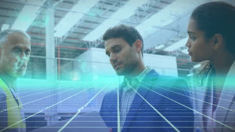 Diverse Professionals Analyzing Futuristic Data in Warehouse