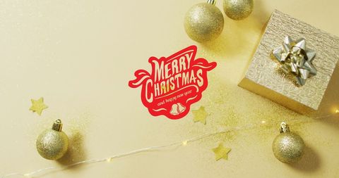 Elegant Christmas Background with Gold Decorations and Present