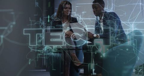 Business Professionals Collaborating in Modern Tech Environment