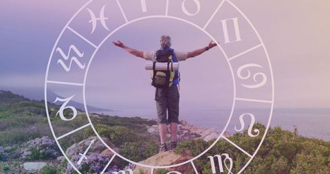 Hiker Embracing Nature with Zodiac Symbols Overlay