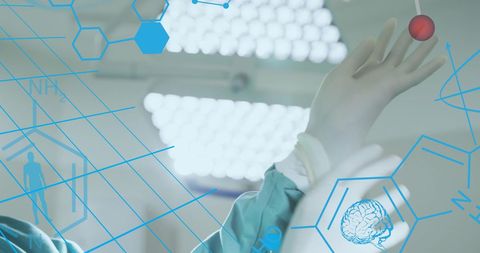 Surgeon Preparing for Surgery with Biomedical Overlay Elements