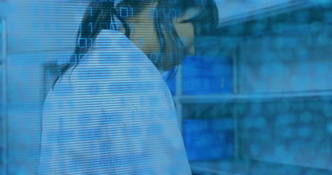 Doctor Analyzing Data in High-Tech Lab Environment