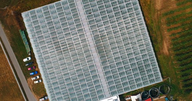 Aerial View of Large Greenhouse Complex on Farmland - Download Free Stock Images Pikwizard.com