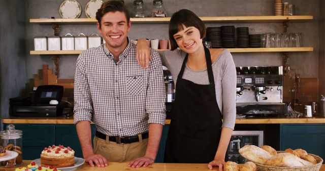 Young Bakery Workers Smiling Behind Counter - Download Free Stock Images Pikwizard.com