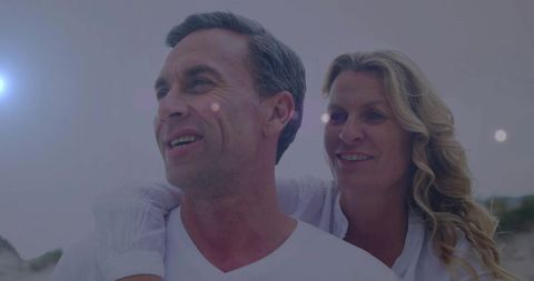 Romantic Couple Enjoying Sunrise at Serene Beachside