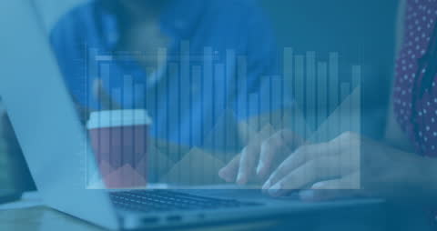 Hands Typing on Laptop with Overlayed Financial Data Graphics